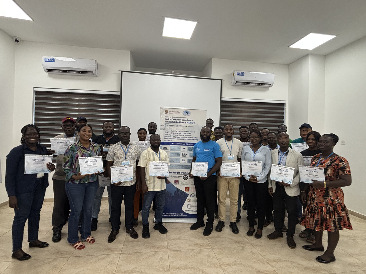 marine litter short course participants holding up their certificates 